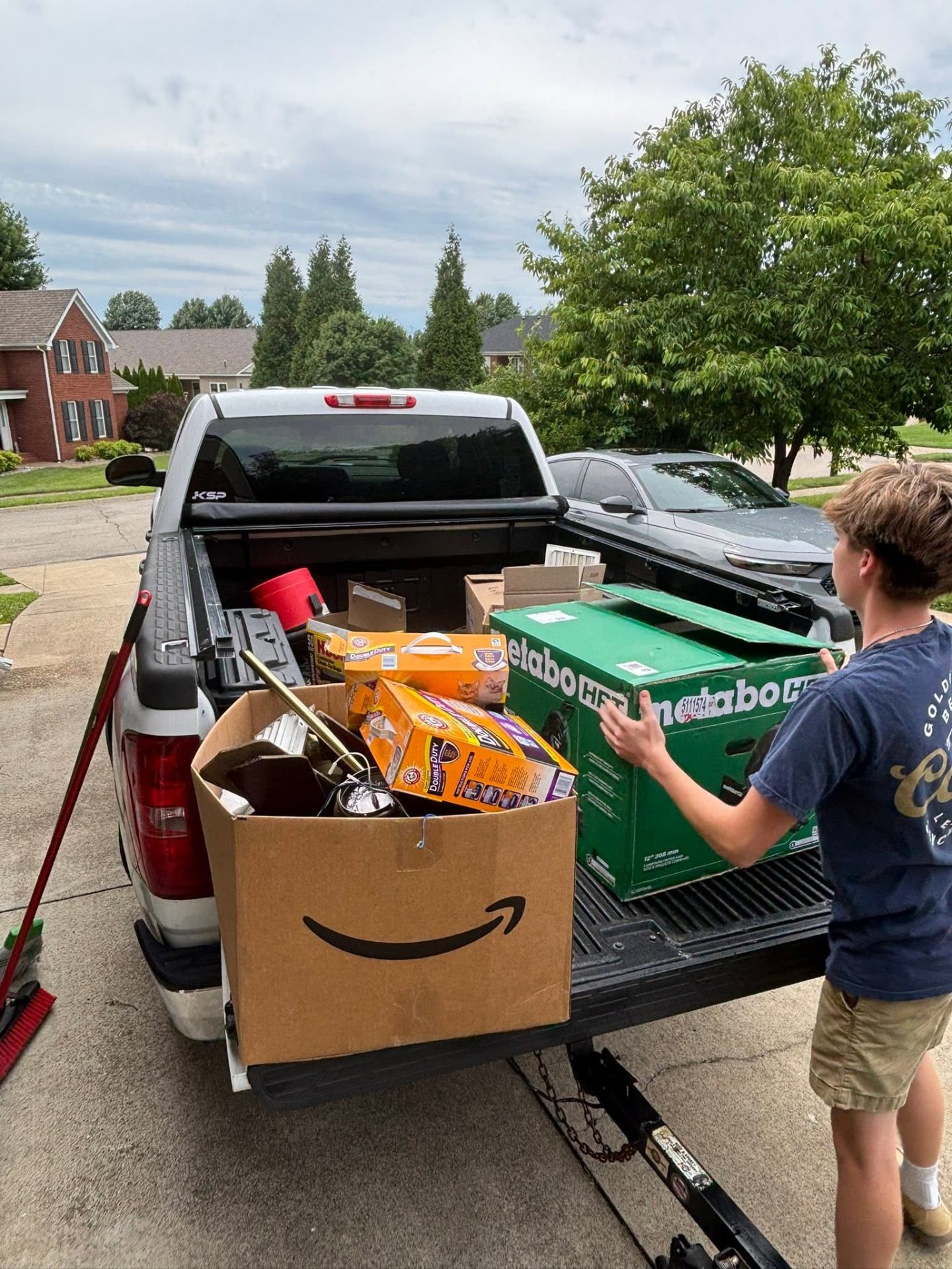 Hurst Junk Removal truck loaded with cleanout debris in Bardstown, KY